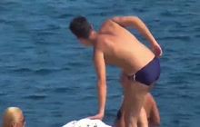 Italians males wear skimpy speedos on the beach 001