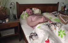 Fat gay dude jacking off on the bed