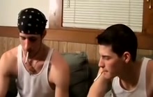 Two guys smoking cigarettes and jerking off
