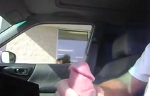 Horny guy playing with his cock inside a parked car
